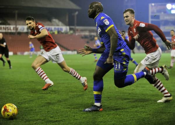 Barnsley's Conor Hourihane, left, and James Bree chase Leeds United's Souleymane Doukara  during Saturday's win for the Reds (Picture: Bruce Rollinson).