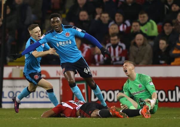 Sheffield United goalkeeper Simon Moore roars in dismay as Fleetwood Town's Devante Cole turns to celebrate his side's second goal (Picture: Simon Bellis/Sportimage).