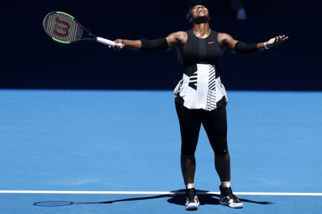 Serena Williams yells as she plays Britain's Johanna Konta in Melbourne. Picture: AP/Kin Cheung
