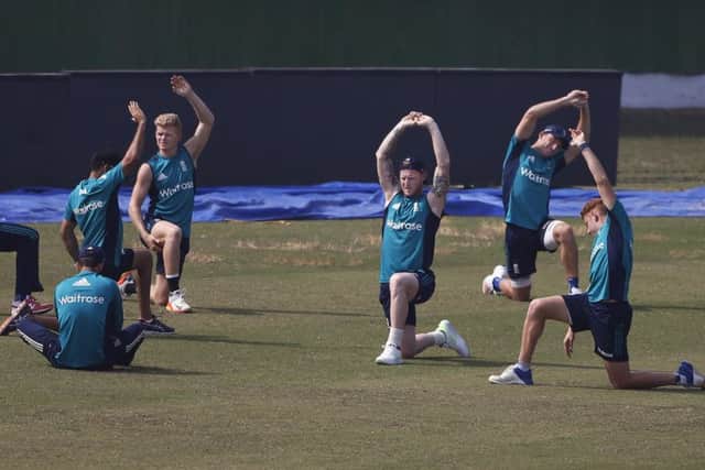 England's cricketers warm up during a practice session in Kanpur on Wednesday. Picture: AP/Altaf Qadri.