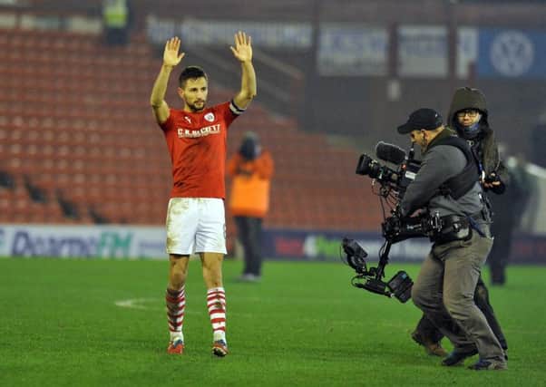 Conor Hourihane salutes the Barnsley fans after what proved to be his last appearance for the club against Leeds United on Saturday.