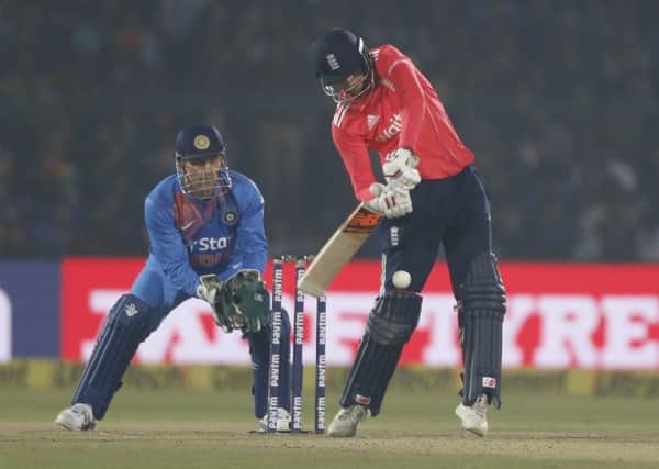 Joe Root plays a shot on his way to 46 not out against India at Green Park stadium in Kanpur. Picture: AP/Altaf Qadri.