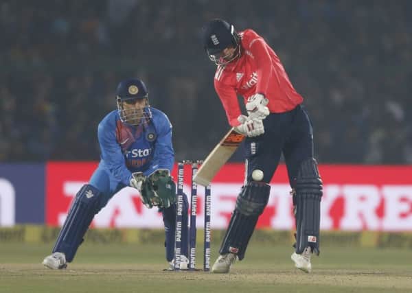 Joe Root on his way to a run-a-ball 46 as England defeated India yesterday in Kanpur (Picture: Altaf Qadri/AP).