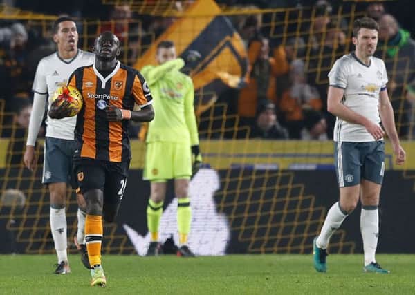 Hull City's Oumar Niasse celebrates scoring his sides second goal during the EFL Cup Semi Final, Second Leg match at the KCOM Stadium.
