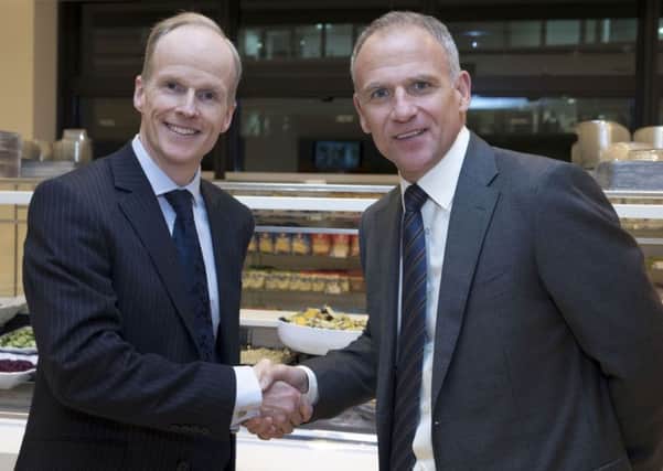 Dave Lewis, CEO of Tesco (right) and Charles Wilson, CEO of Booker