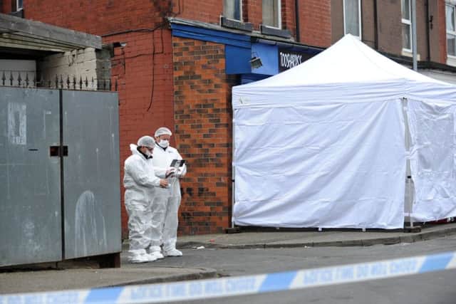 Police at the incident scene on Gathorne Terrace in Leeds. Picture: Jonathan Gawthorpe