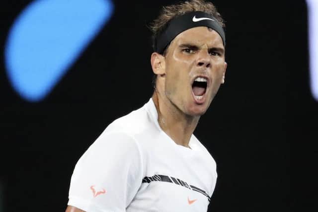 Spain's Rafael Nadal reacts after winning the third set against Bulgaria's Grigor Dimitrov at the Australian Open of  2017. (AP Photo/Aaron Favila)