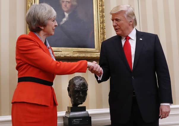 How should Theresa May deal with Donald Trump?