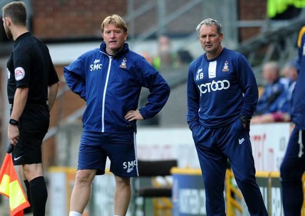 Bradford City manager Stuart McCall and his assistant Kenny Black.
 Picture : Jonathan Gawthorpe