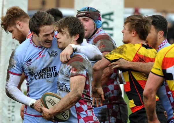 Rotherham Titans' George Tresidder is congratulated after scoring a  try against Richmond .