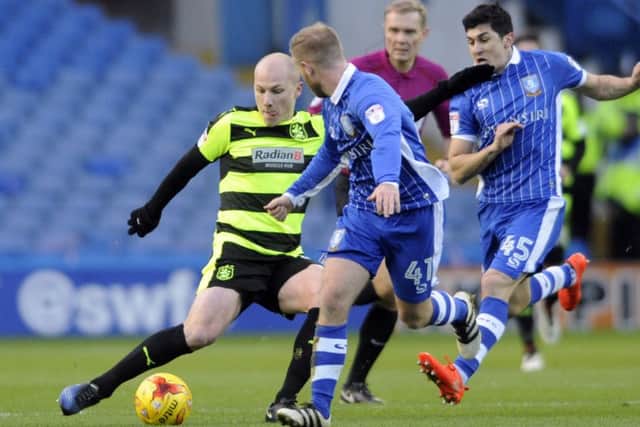 Huddersfield Town loan star  Aaron Mooy could be recalled or sold