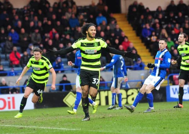 Huddersfield Town's Izzy Brown celebrates scoring his penalty. Picture: Simon Hulme