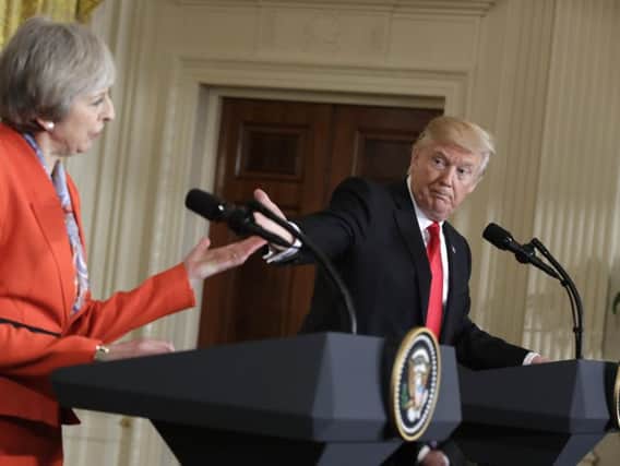 Donald Trump with Theresa May in Washington