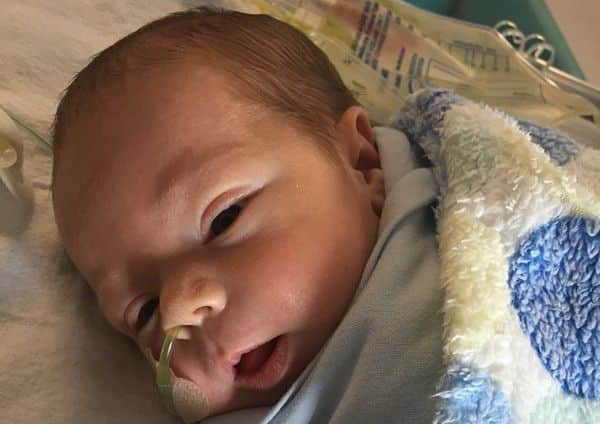 Henry underwent a six hour operation at just 13 hours old