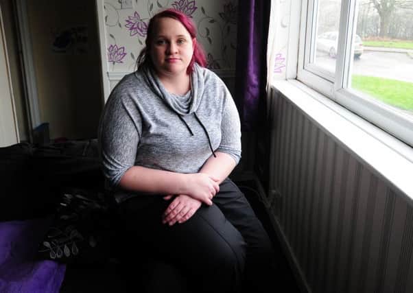 Claire Robinson, pictured at her home in Leeds, says she struggles to make ends meet.