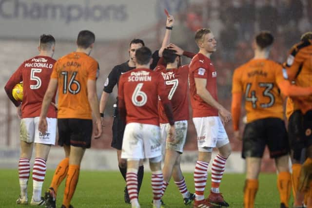 Alex Mowatt is sent off by referee Christopher Kavanagh in his first game playing for Barnsley.
 (Picture: Bruce Rollinson)