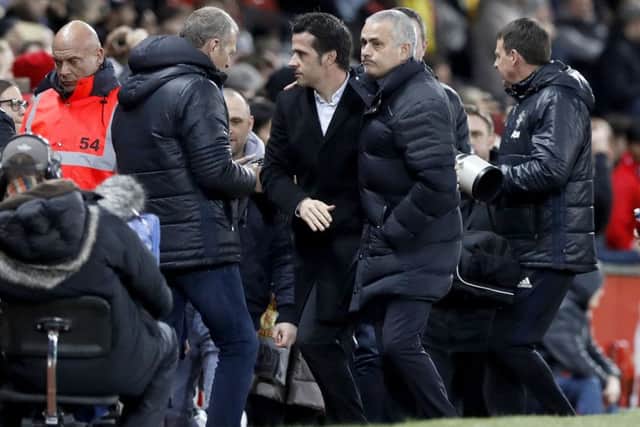 Manchester United manager Jose Mourinho and Hull City manager Marco Silva greet each other before kick-off.