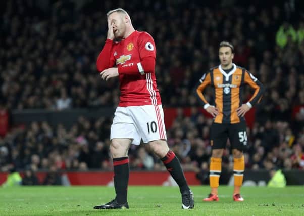 Manchester United's Wayne Rooney is dejected after a missed chance.