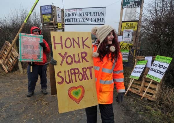 Should passing motorists honk or hoot in support of fracking protesters?