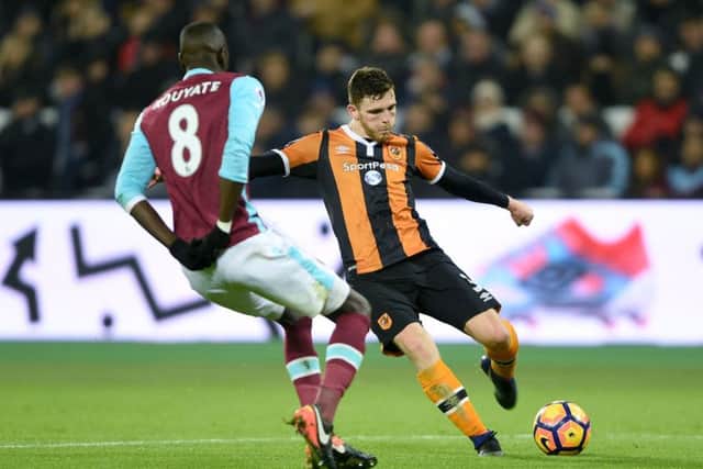 Hull City's Andrew Robertson takes a shot but hits the post during the Premier League match with West Hame (Picture: PA)