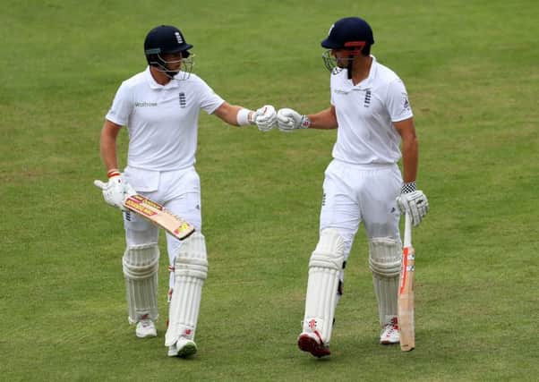 England captain Alastair Cook and Joe Root pictured during a Test at Old Trafford last summer (Picture: Richard Sellers/PA Wire).
