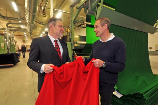Labours Shadow Secretary of State for International Trade, Barry Gardiner MP, chats to Adam Hainsworth boss at Hainsworth Textiles in Pudsey. Picture Tony Johnson.