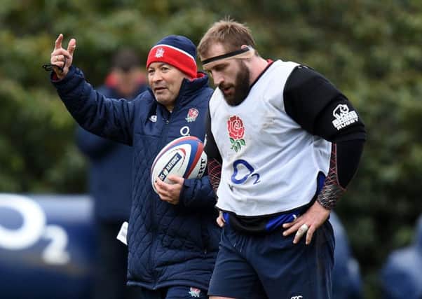 England head coach Eddie Jones, left, and Joe Marler pictured during a training session last year (Picture: Andrew Matthews/PA Wire).
