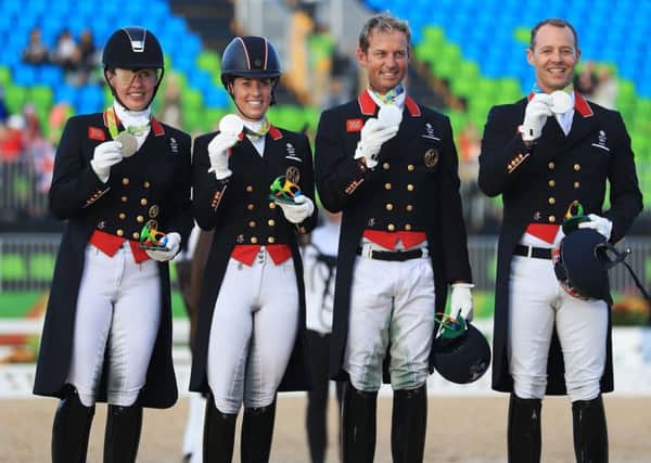 Crowning moment: Fiona Bigwood, left, with Charlotte Dujardin and Carl Hester and Spencer Wilton after winning silver in Rio.