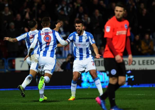 Huddersfield's Tomy Smith celebrates scoring his side's opening goal against Brighton. (Picture: Jonathan Gawthorpe)