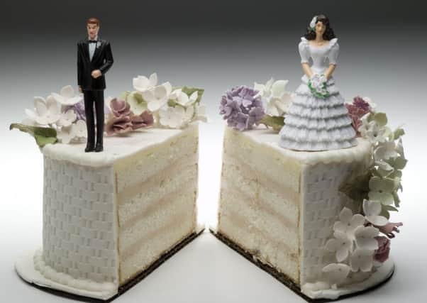 A Generic Photo of a cake split in half, illustrating the concept of divorce.  Picture credit should read: PA Photo/thinkstockphotos.