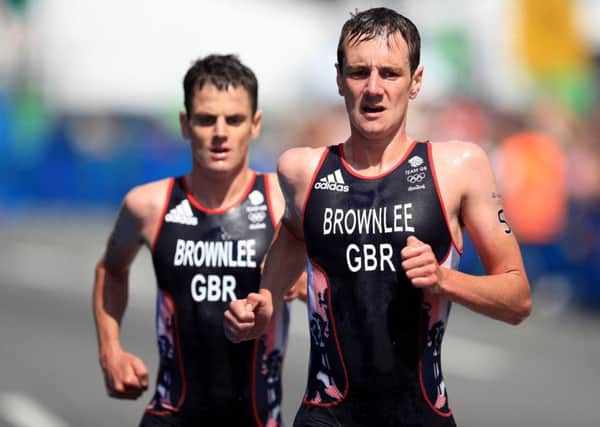 Great Britain's Alistair Brownlee leads from brother Jonny at the Rio Olympics.