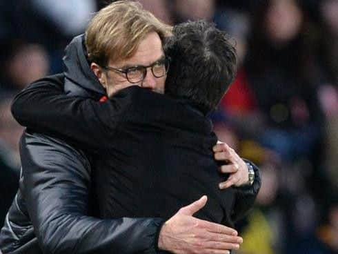 Jurgen Klopp embraces Marco Silva moments before full-time