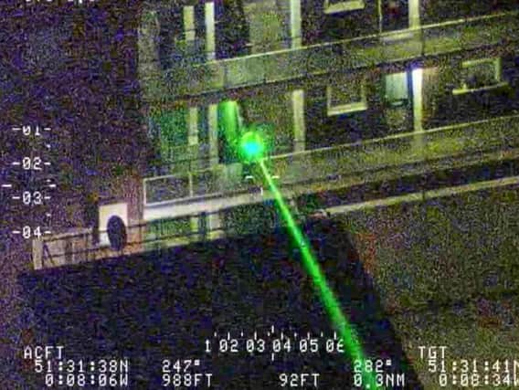 Image issued by the National Police Air Service (NPAS) of an incident in which a laser was directed at a police helicopter, as people shining laser pens at pilots, train and bus drivers could be jailed or face hefty fines under a tougher new law. (Photo: NPAS/PA)
