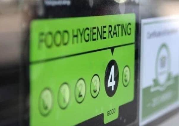 Food outlets will have to display their Food Standards Agency hygiene ratings under new rules set to be introduced across England by 2019.