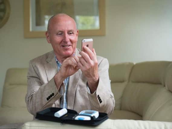Ilkley businessman Martin Smith using the Inhealthcare app