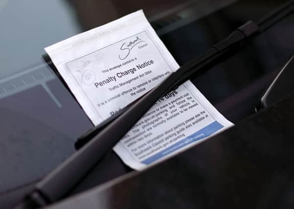 File photo dated 31/10/16 of a penalty charge notice (PCN) parking ticket issued on the windscreen of a car, as motorists are being hit with unnecessary fines because councils are failing to explain their right to challenge parking tickets, the local government watchdog has warned. PRESS ASSOCIATION Photo. Issue date: Monday February 6, 2017. A report by the Local Government Ombudsman for England found that when motorists did seek to challenge a fine "all too often" their claim was rejected out of hand without any proper consideration or explanation. See PA story TRANSPORT Parking. Photo credit should read: Yui Mok/PA Wire