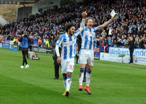 Huddersfield Town goalscorers Izzy Brown, left, and Michael Hefele celebrate Championship victory over Leeds United (Picture: Tony Johnson).