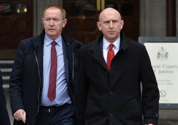 Labour MPs Sir Kevin Barron (left), MP for Rother Valley and John Healey, who represents Wentworth and Dearne, leave the Royal Courts of Justice