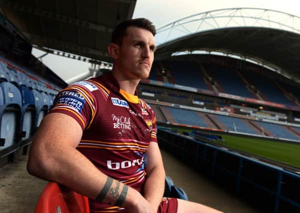 Stand-off Lee Gaskell is happy to be at Huddersfield but accepts he has a tough task ahead to get into the Giants' side (Picture: Bruce Rollinson).
