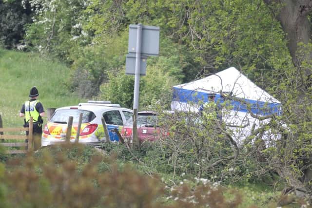File picture shows the scene picture near the village of Tong, Bradford, where the bodies of 2 men were found in May 2011. See Ross Parry copy RPYMURDER : A man believed to be the first person extradited from Pakistan in ten years is due to appear in court charged with murder. Mohammed Zubair is accused of murdering Imran Khan, 27, and Ahmedin Khyel, 35, whose badly beaten bodies were found on the side of the road in Tong, Bradford, West Yorks., in May 2011. Zubair boarded a flight to Pakistan less than 24 hours after the killings. But after being held in custody in Pakistan since 2013, he has now been extradited back to the UK to face justice. He will appear at Bradford Magistrates Court this morning (Thurs). Det Supt Simon Atkinson said: "After five years, West Yorkshire Police has managed to arrange the extradition of Mohammed Zubair, who has been held in custody in Pakistan since November 2013.