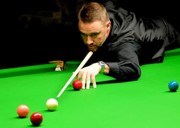 Stephen Hendry at the snooker table.