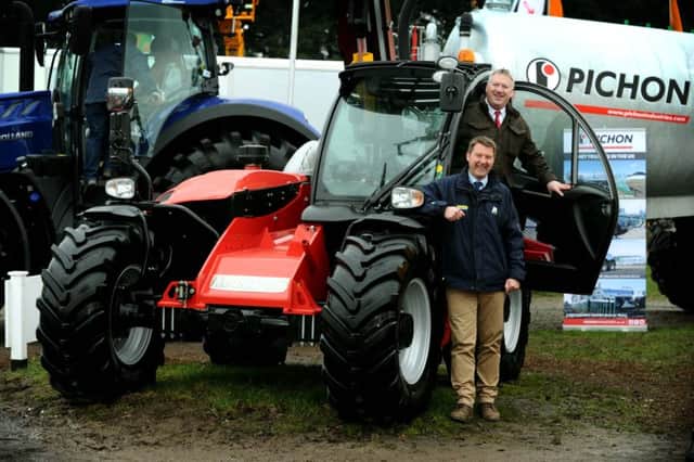 Paul Russell and the Manitou NewAG, with Manitou sales boss Andrew Dixon.   Pictures: Jonathan Gawthorpe