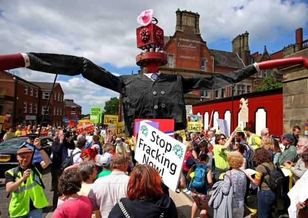 A fracking demonstration in Lancashire where contractors have been forced to stop providing services to a fracking site.