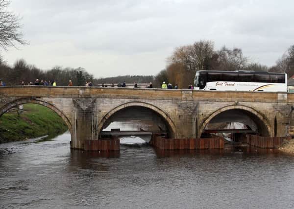 reBuilding bridges: The Local Enterprise Partnership invested Â£1.4m into helping to widen Tadcaster Bridge which reopened this month. Picture: Danny Lawson/PA Wire