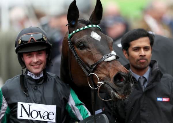 Jockey Nico de Boinville and Altior in the winner's enclosure after victory in the Sky Bet Supreme Novices' Hurdle at Cheltenham last year (Picture: David Davies/PA Wire).
