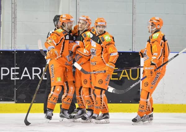 Sheffield Steelers' players celebrate against Fife Flyers on Wednesday night. Picture: Dean Woolley.