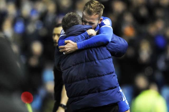 .Jordan Rhodes embraces his dad Andy after his goal.