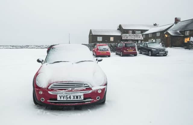 Snowy conditions at the Lion Inn in the North York Moors National Park
