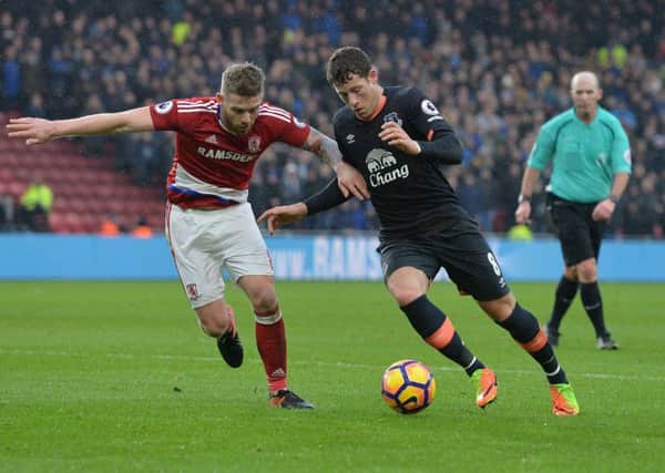 Middlesbrough's Adam Clayton, left, and Everton's Ross Barkley battle for the ball
