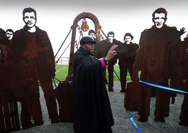 The Archbishop of York, Dr John Sentamu, blesses the Lost Trawlermen Memorial at St Andrew's Quay, Hull. Picture by Simon Hulme
